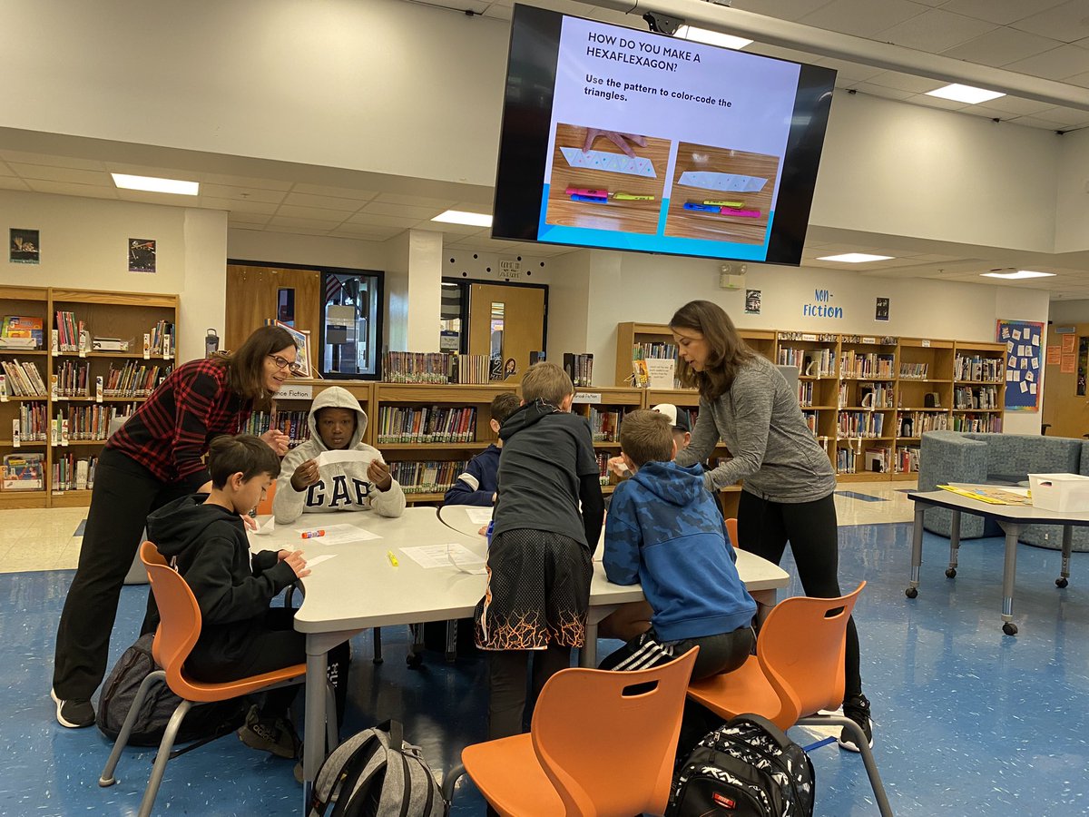 MADISONCUSD200's tweet image. Math Club is hopping into the weekend with 3 staff and 4 parent volunteers helping kids build trihexaflexagons! #mathclub #madisonstrong #yourcommunityschools
