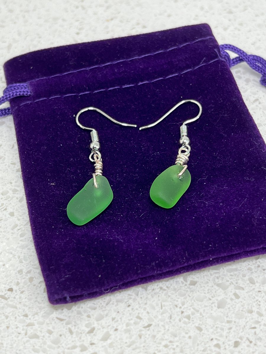 Excited to share the latest addition to my #etsy shop: Green Dangling Glass Earrings, Dangling Earrings, Green Sea Glass Earrings, Beach Glass Earring etsy.me/3MmBbNr #green #no #unisexadults #glass #earwire #bohohippie #earlobe #danglingearrings #greenseaglass