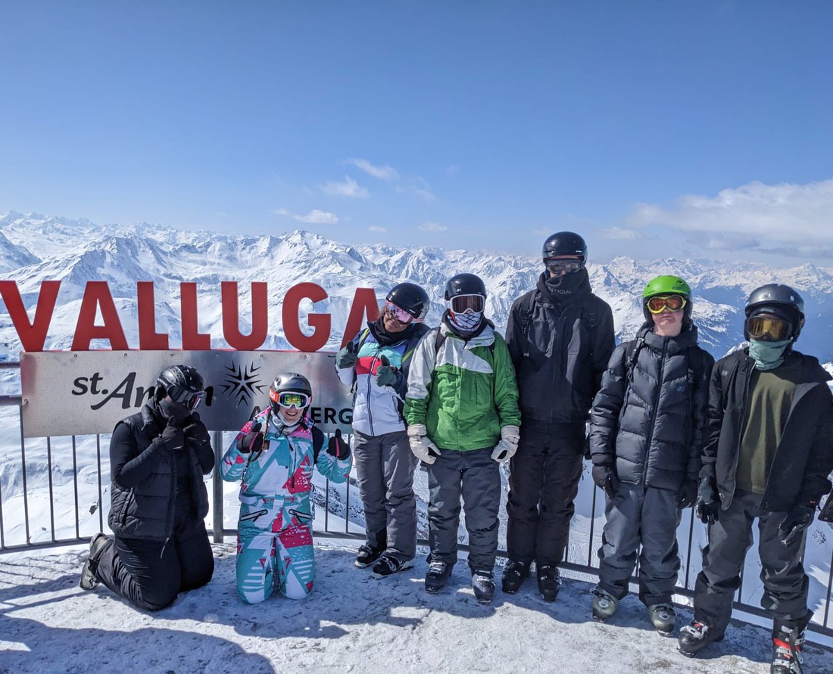 STACSSki23's tweet photo. A few with our view in the background after venturing up the highest peak this morning! 🏔️ https://t.co/wAomdAkRmM