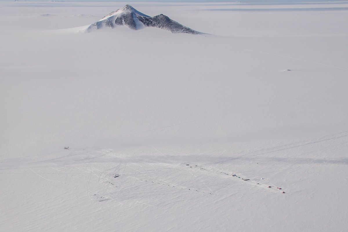 Hughes_Matt's tweet photo. It doesn't look like much but this is one of the most important places in Antarctica for us. 

This is Sky Blu, sitting down at the base of the peninsula, it's your last stop before going ‘deep field’. We've got fuel here, an ice runway, and supplies to keep you going for months. https://t.co/QTC4G6lbOI