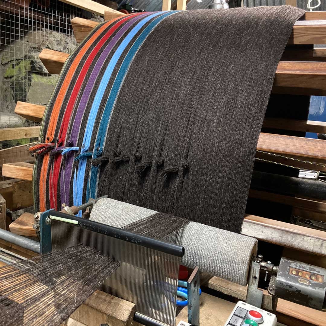 SkyeWeavers's tweet photo. Warping our Pooltiel Sunset Throws. The stripes represent the sea and sky, and we used brown Hebridean wool for the ‘land’.  #inspiredbyskye https://t.co/SoidqIQrZP