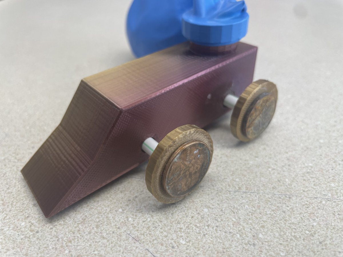 mrdulberger's tweet photo. Well this is pretty cool!
One of my Invention & Innovation students used @tinkercad to design a balloon powered car. It’s completely made out of @dremel 3D Printed parts except for the straw “bearings,” penny hub caps and balloon. #3dprinting #mimscte https://t.co/rFs7YY500U