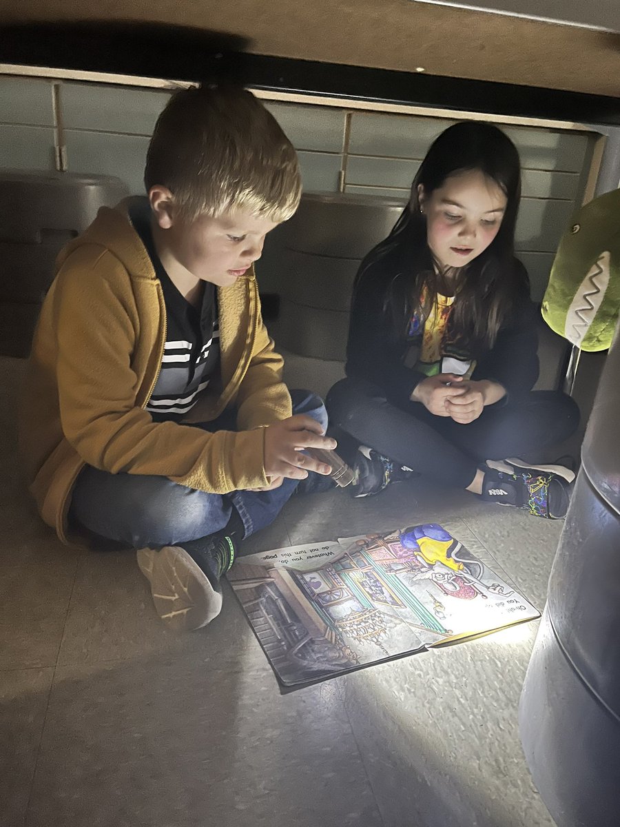 Students were shining bright during flashlight reading! #OakFlatProud #BSSDProud