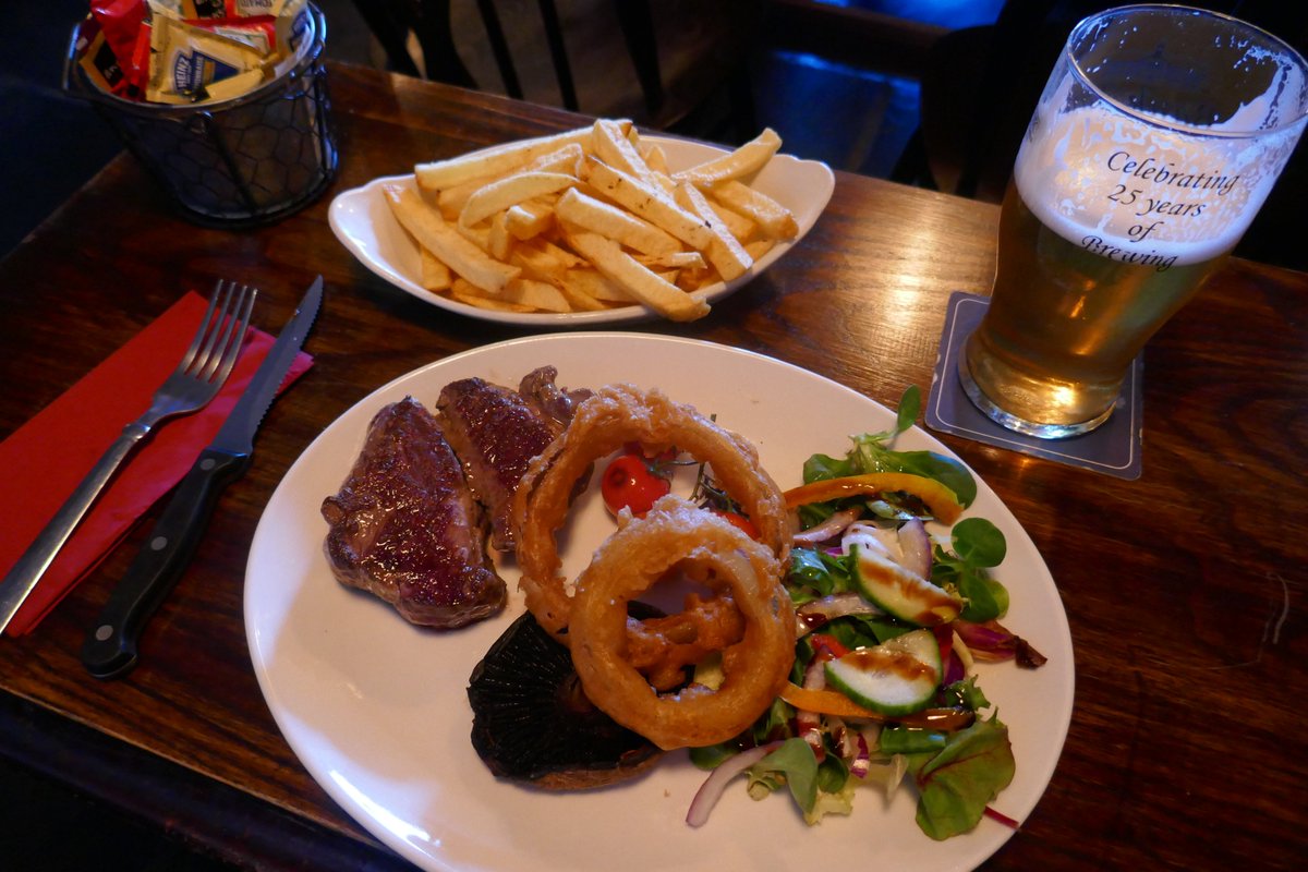 TheLengthsman's tweet photo. Great start to the holidays with a fillet steak at The Britannia tonight in #PennyBridge washed down with lashings of @loweswater ginger beer 😉
There were these two strange guys watching me eat ?
#Manbehavingbadly
#steakbox #Chips #beer https://t.co/XosjWJSYs9