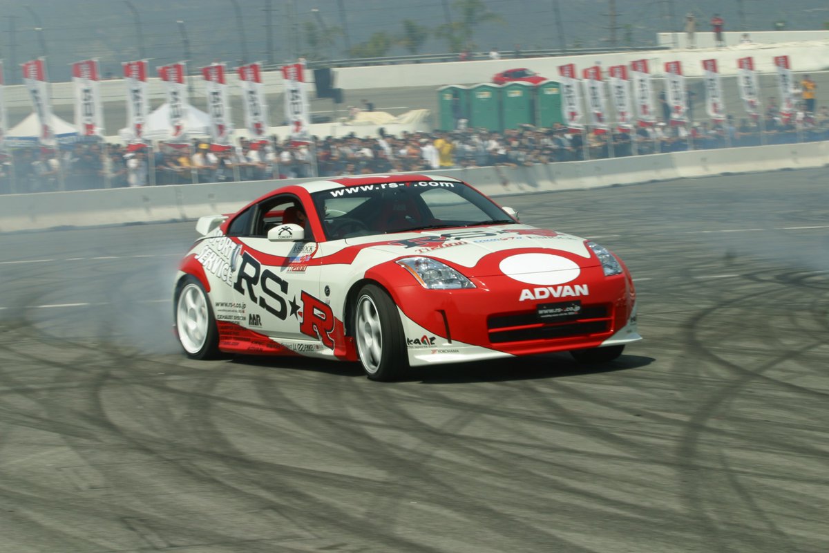 RSRUSA's tweet photo. History was made 20 years ago 😍at Irwindale Speedway when RS-R presented the first RS-R Drift Festival. For the first time, drifting pros @MAXORIDOMANABU and Kazu Hayashida took the wheels behind the RS-R Supra and 350Z to showcase drifting on USA soil! https://t.co/olDuMuODNw