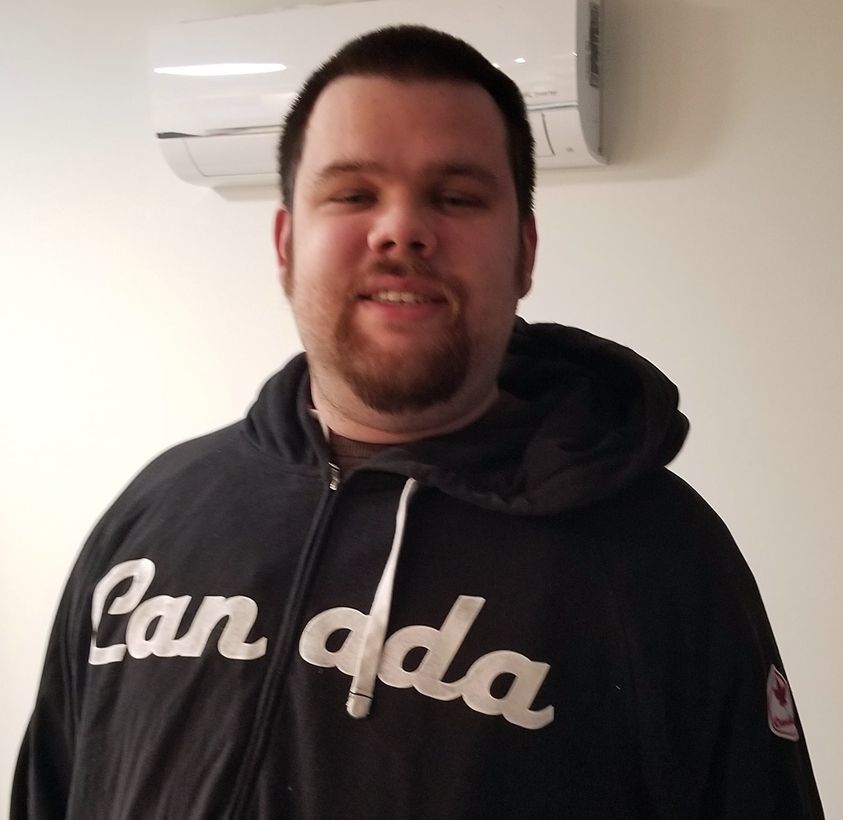 Conor happy wearing his Canada sweater.
