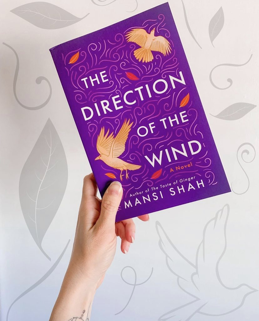 Here are more beautiful photos for our Bookstagram &amp; Creative tour for The Direction of the Wind by <a href="/mansiwrites/">Mansi Shah</a>!! 😍💜 Thanks to 📝<a href="/rozanne_visagie/">Rozanne Visagie | Bookstagrammar</a> for the stunning Bookstagram &amp; Blog post: willowscornerbook.wordpress.com/2023/04/06/boo… And also look at the gorgeous feature by 📸@/reader.riss! 🔥