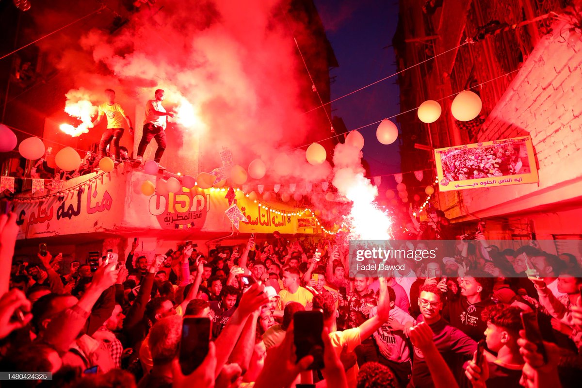 GettyImagesNews's tweet photo. Egyptians celebrate the holy month of Ramadan with fireworks and a collective iftar, or fast-breaking evening meal, in the Ezbet Hamada district of Cairo. 📷: Fadel Dawod https://t.co/BnBJrwmsCw