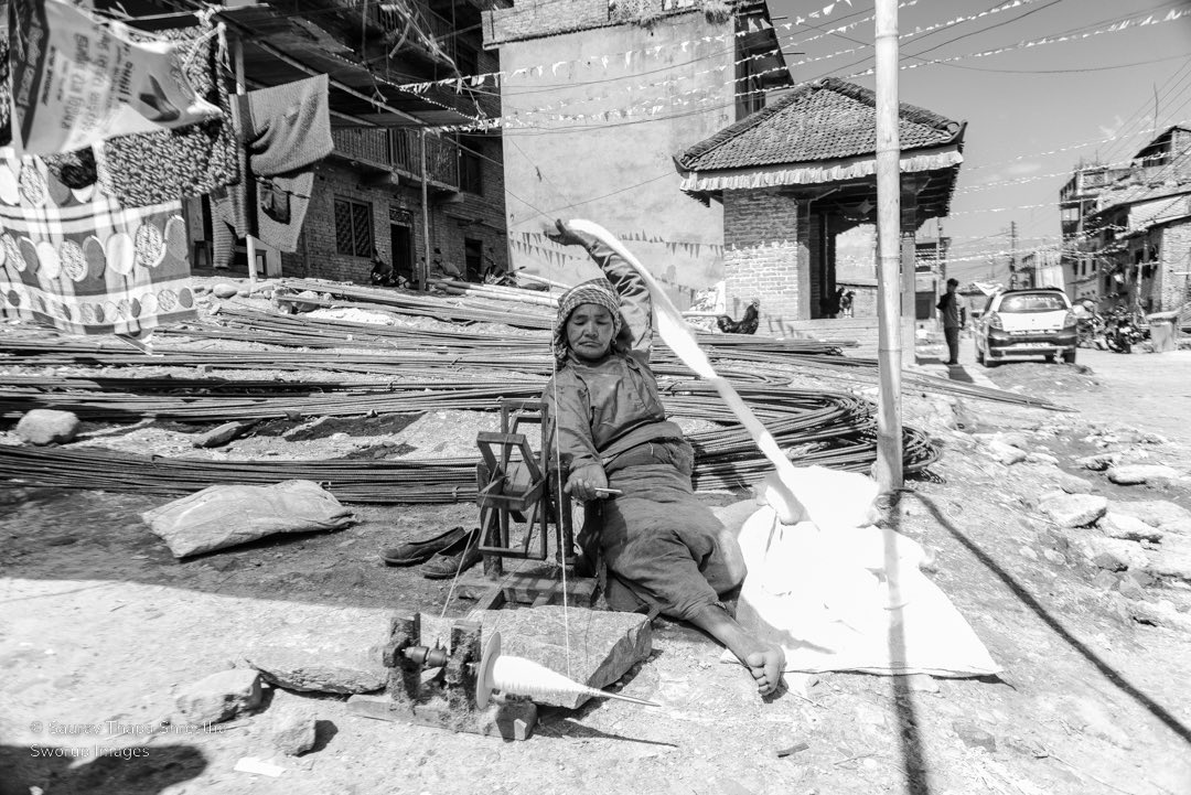 sworupsth's tweet photo. A woman is making cotton strings using a traditional weaver at Pyangaun, Lalitpur, on April 5, 2023. Pyanguan is 14 km from Kathmandu, where locals predominantly make beautiful bamboo products. The bamboo is called ‘pyang’ in newa language. #sworupimages

https://t.co/CVb9lBbdRg https://t.co/o1YlbhVa72