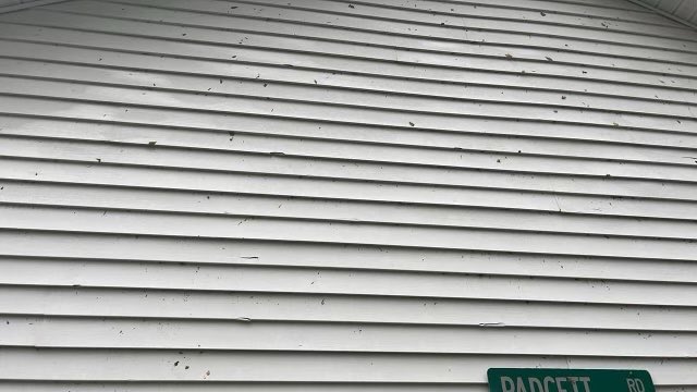OfficerBrian728's tweet photo. Not a good day. Cars dented. Siding and roof damage from hail in Hughesville, Md. @WTOPWeather @weatherchannel @NWS @SOMDWxNews https://t.co/fCIEKXrLAG