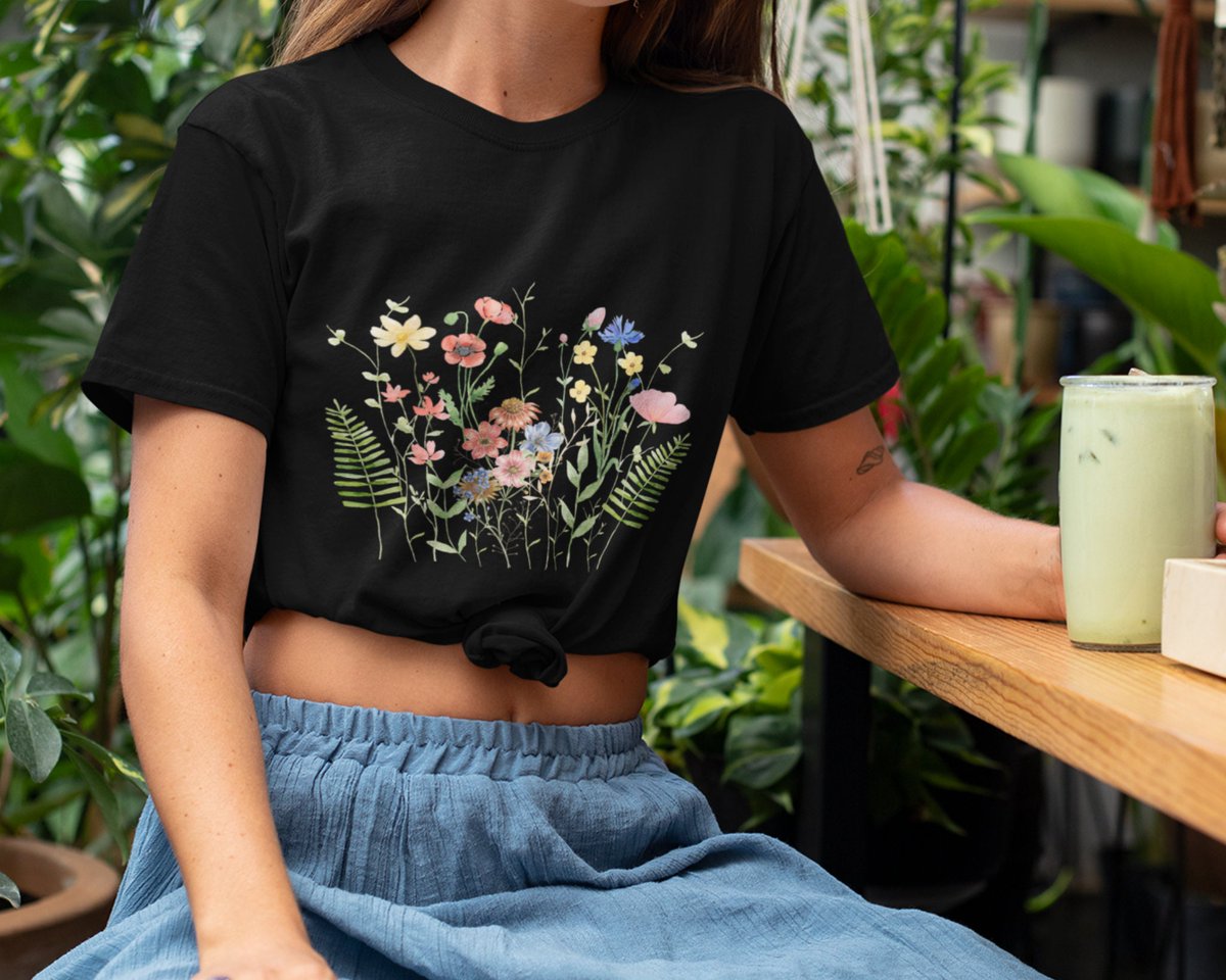 jaimieruth's tweet photo. Excited to share the latest addition to my #etsy shop: Pressed wildflowers shirt, retro summer floral tee, spring flower tee, blossom flower shirt, cottage core shirt, forest core shirt for women https://t.co/0ddNMZY8Pd #gardenloveroutfit #vintagemomshirt #summerfloral https://t.co/BGgGctJUqQ