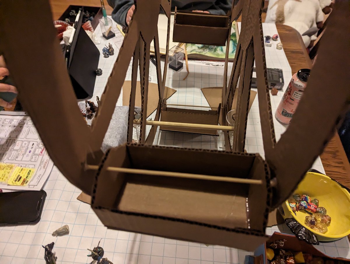 TonyHoWasHere's tweet photo. My DnD campaign takes place in an alt-history fantasy version of the 1893 Chicago World's Fair. After 2+ years, they're finally facing the BBEG at the Ferris Wheel so of course I had to build one. https://t.co/y2FbtMfqGp