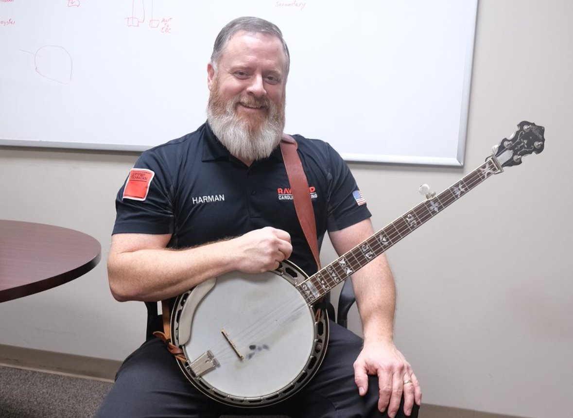 Tomorrow is #NationalBanjoDay, a day to recognize Carolina Handling's resident banjo picker, Harman Rutledge. #eliteassociates #eliteperformance