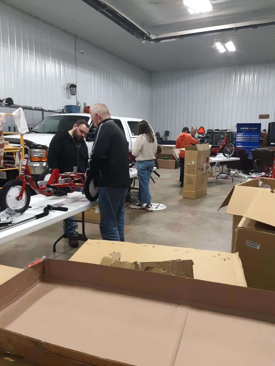 GCC_AMBUCS's tweet photo. #GCCAMBUCS and guests were at it again last night! #Amtrykes for kids and adults with special abilities were assembled and will be given to their recipients soon. #Pizza was also there cuz…building bikes makes you hungry! 🍕😂 #InspiringMobilityAndIndependence #Ambucs https://t.co/FuAkI0cPL5