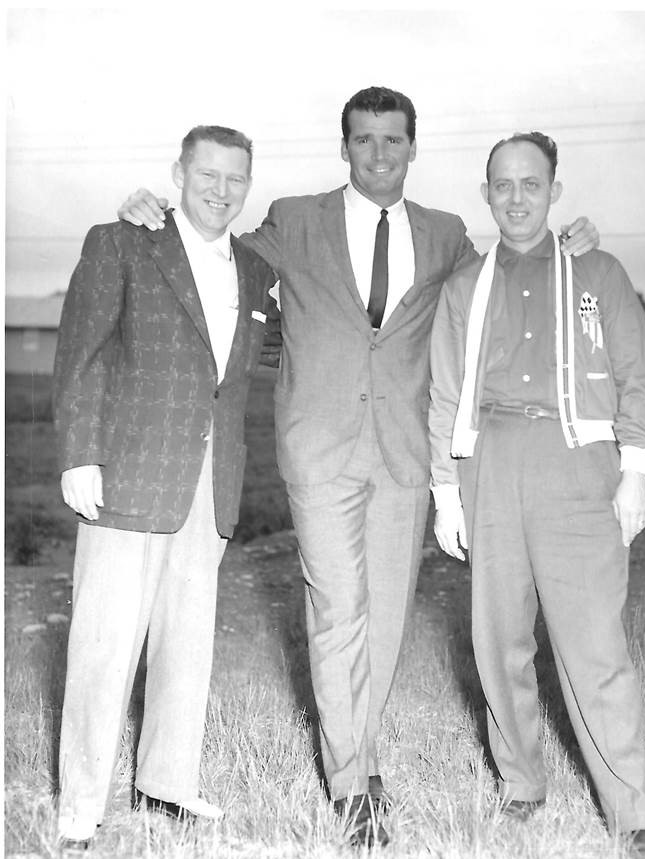 @LiterateIndy @IMS Here's a picture of James Garner at the Sun Valley Speedway in Anderson, Indiana. That's my uncle on the right, Bob Byrne; he was a sportswriter for the Anderson Herald. I think this was taken in 1962 or 1963. Not sure who that is on the left...