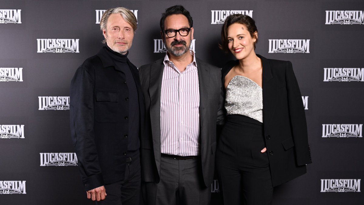 IndianaJones's tweet photo. Phoebe Waller-Bridge, Mads Mikkelsen, and Director/Co-Writer James Mangold join Producer Kathleen Kennedy on stage at #StarWarsCelebration to debut the new trailer for #IndianaJones and the Dial of Destiny. https://t.co/I953UFEAlO