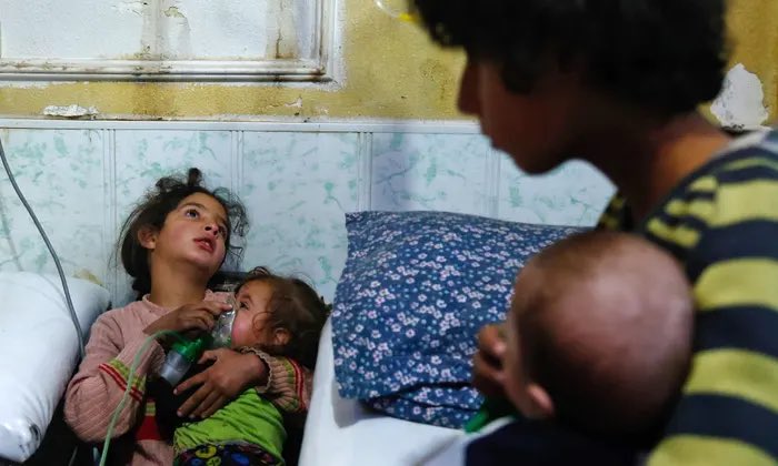 syrianetf's tweet photo. On this day 5 years ago, April 7, 2018 the Assad regime bombed the city of Douma with explosive barrels containing chlorine gas suffocating over 40 people to death, and harming more than 500 civilians. We will never forget. https://t.co/8hEhkuohWJ