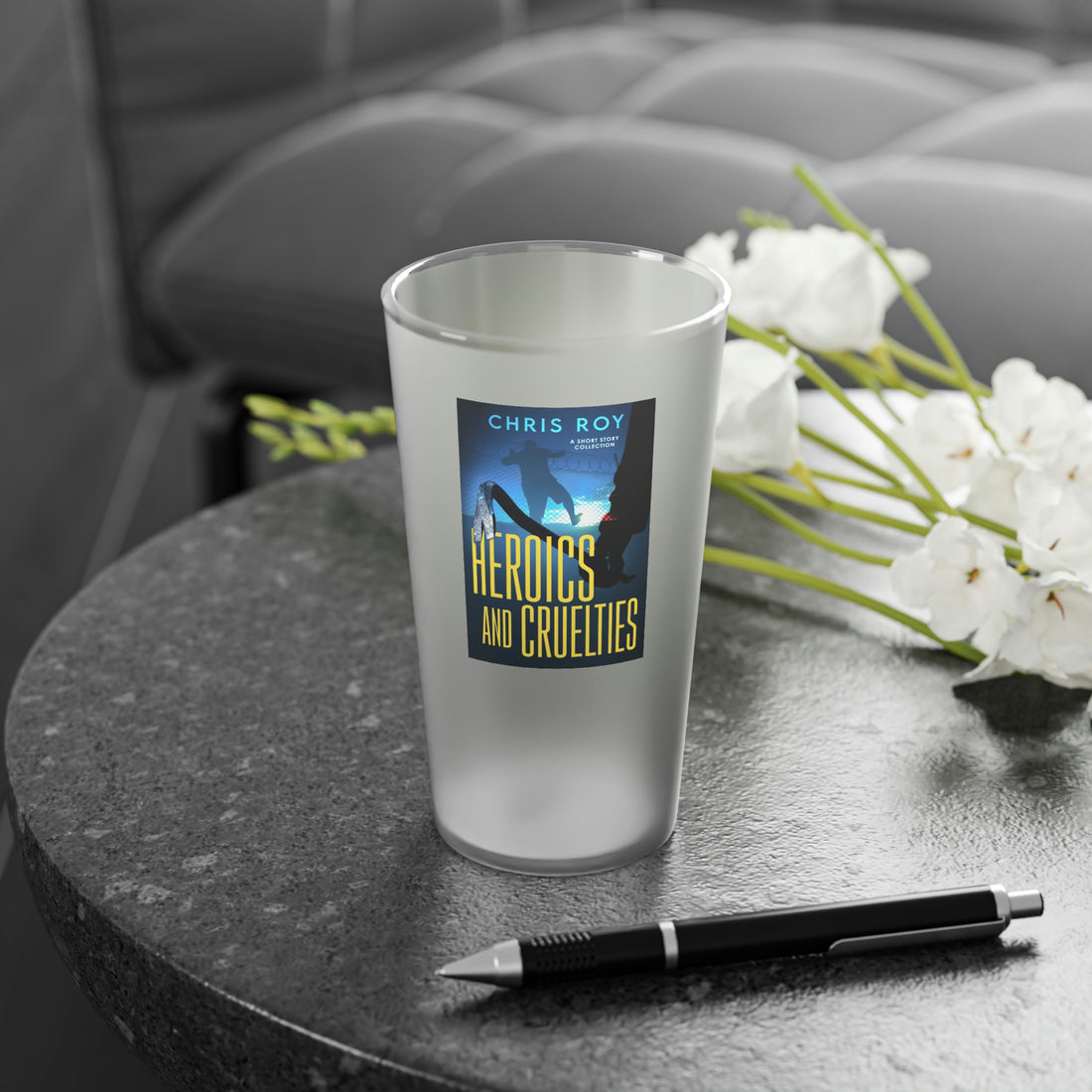 This frosted matte finish pint glass is versatile and dishwasher-safe. The cover art in this pint glass is from Chris Roy's book, Heroics And Cruelties.

litmatter.com/products/heroi…