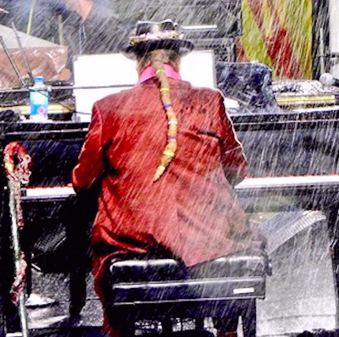 akadrjohn's tweet photo. #DrJohn @ #JazzFest 2016, playing through the rain. https://t.co/DRbxCgMVC5