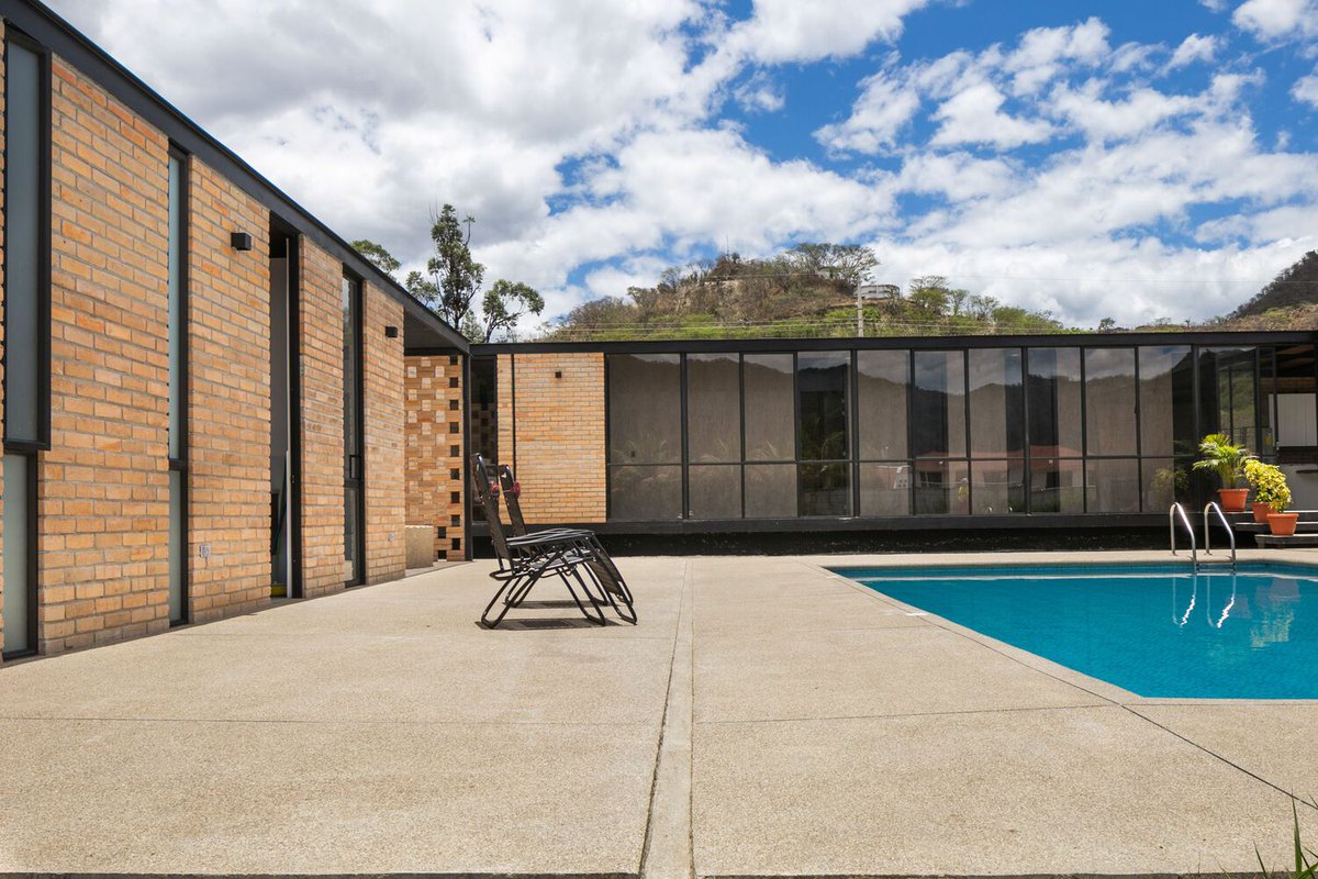 LadyDee101's tweet photo. A spacious pool deck is just one of the impressive amenities offered by this #modernhome. #backyard  https://t.co/HCCCoMDaVO https://t.co/3tURl5cpId