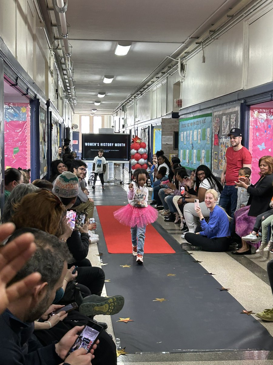 PS125M's tweet photo. Fashion show in honor of women’s history month. Each child had a shirt with a meaningful quote from a woman with whom they felt connected to and had learned about. Women’s history, present and future!
@District5NYC #thefutureishers
#herstory https://t.co/Q889n7Rmuw