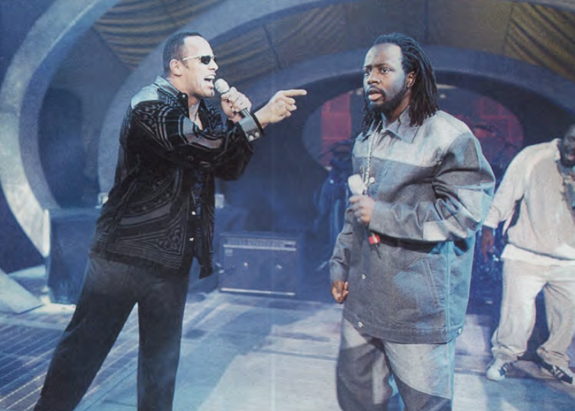 watchthe_kick's tweet photo. The Rock and @BookerT5x squaring off in 2001 #SmackDown #WWE https://t.co/wMnUZ6qyqh