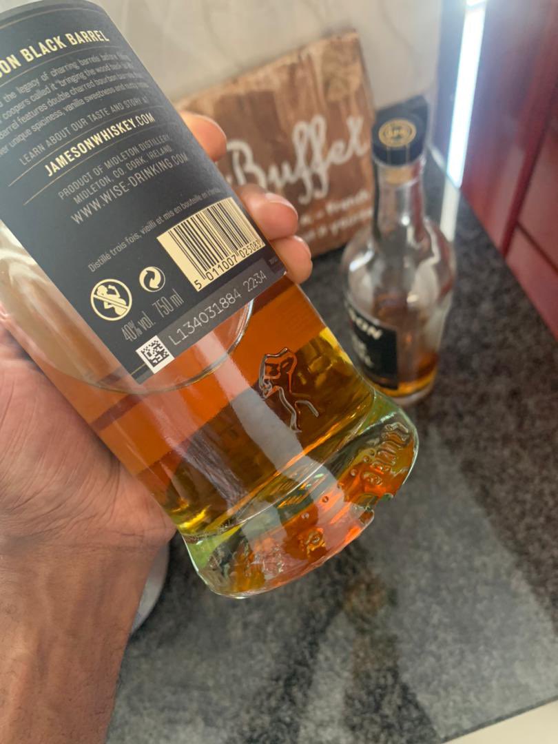Chizle_12's tweet photo. I had two beers and two double Jamie Black Barrels last night and woke up feeling very messed up. I did a comparison with another bottle I had and spotted these notable differences. @JamesonZAM @sampanakamba please help me understand which is the original to avoid this “headache” https://t.co/JrtLOsIiIq
