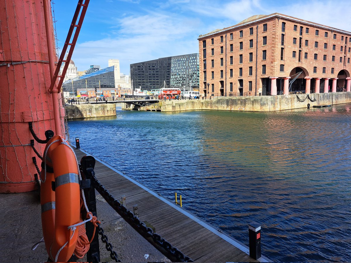 russclaydon's tweet photo. Liverpool waterfront looking great in the spring sunshine. Impressed by the jelly bean Beatles mural #letitbean #Liverpool https://t.co/6R44UVrahK