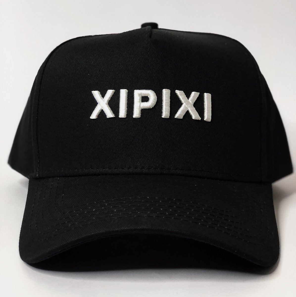 XipixiOfficial's tweet photo. #Xipixi proudly unveils its new logo signaling a new corporate identity. The new logo boasts a minimal, functional, sleek and modern sans-serif typeface adaptable to formal and informal clothes and accessories.The new logo can be seen in the new baseball caps and shopping bags. https://t.co/s8B0EbqBo1