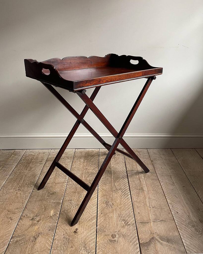 New in: Georgian mahogany butlers tray on stand. Beautiful tray with shaped surround and fretted handholds, on a simple folding stand with square legs and stretchers. Circa. 1780 ____ #butlerstray #mahoganybutlerstray #antiquebutlerstray #georgianfurn… instagr.am/p/CqxdxwtIjrL/