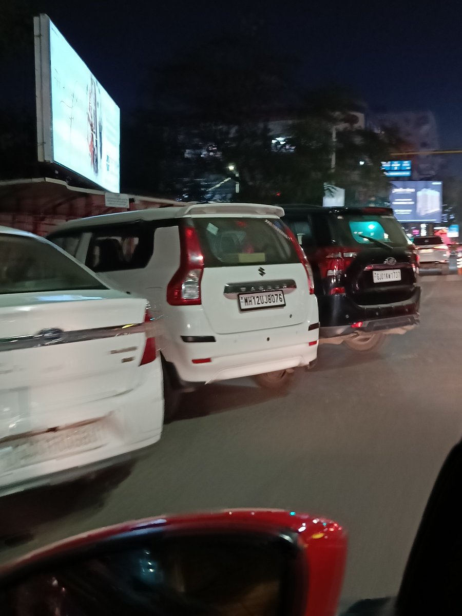 meenukaul's tweet photo. So cars are randomly parked on the main road  as valet parking for Someshwar RO gola and others on Judge's Bungalow crossroads despite signboard saying left turn open. Traffic jam is a regular feature but @PoliceAhmedabad @AhmedabadPolice turning a blind eye https://t.co/92DG7KjdHx