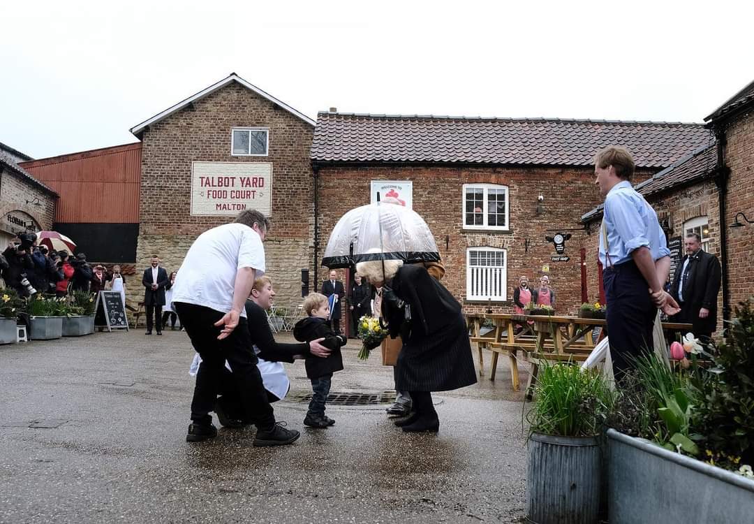 sharongleave's tweet photo. So... if you zoom in you can see Thomas in the corner recording on his phone.  He did get to meet the King and Queen Consort when they visited Malton on Wednesday.  He was introduced to them by Florian and had a one on one chat with our King for a few minutes! @QueenElizHigh https://t.co/0UsOiI3c2e