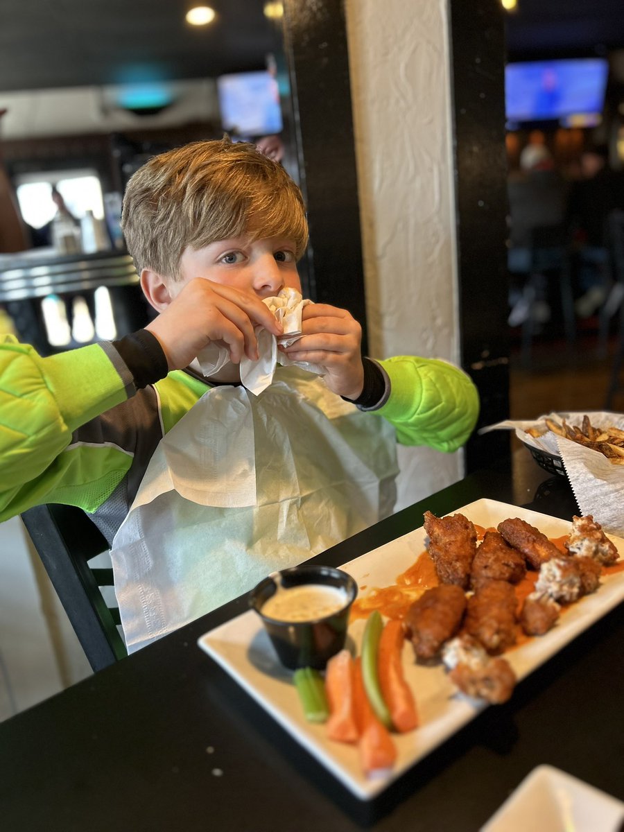 meggieyoung1's tweet photo. After a week of professional disappointments, I’m finding joy in watching my youngest eating too many wings before playing another soccer game. #questionabledecisions #academicmamas https://t.co/sjMiALNRD5
