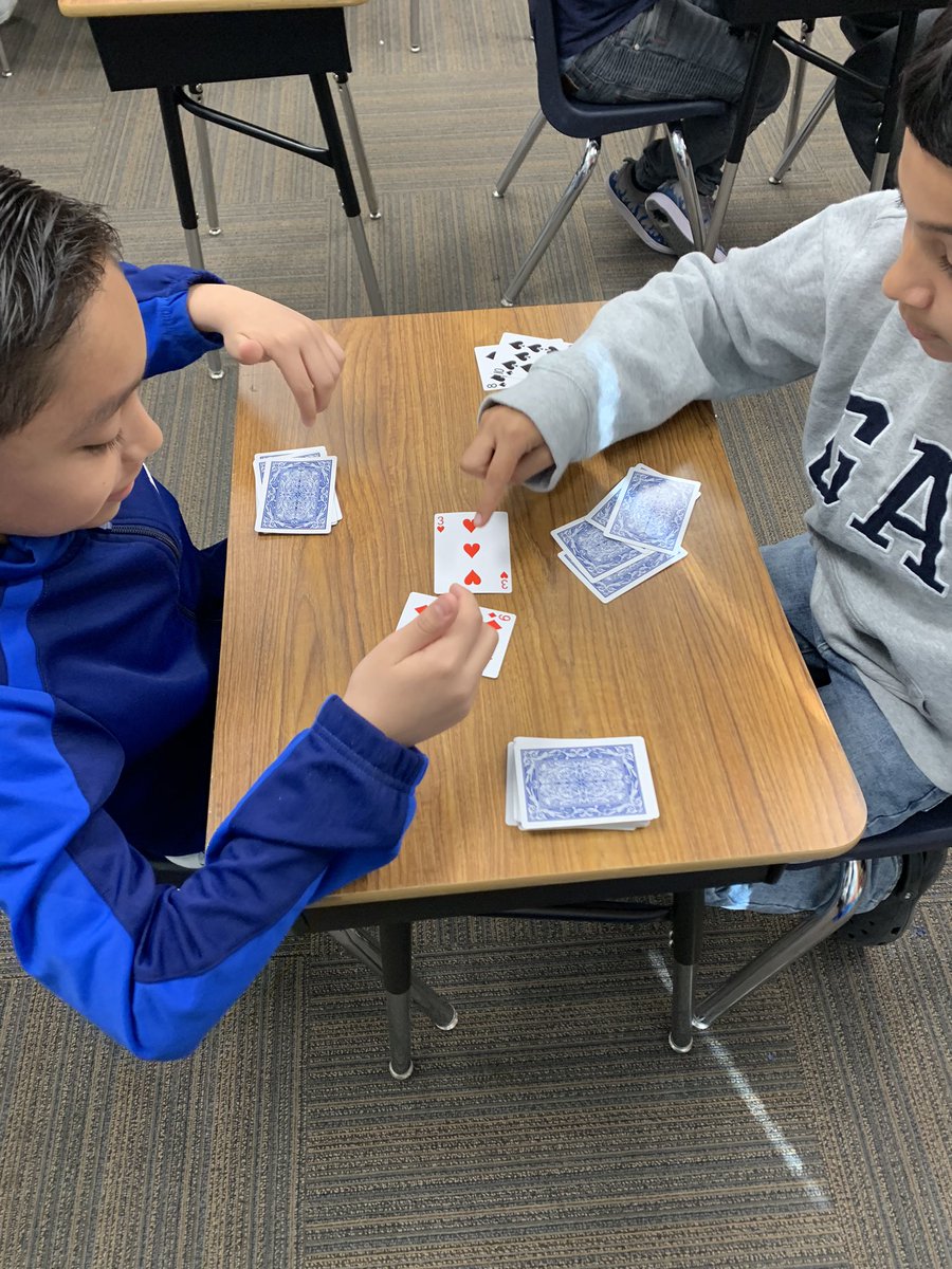 Chastain4HG's tweet photo. After working so hard on State Testing the last 2 weeks we needed a break from technology, but still needed to practice our math fluency skills. Multiplication War for the win. #engaged #focused @HazelgroveKck https://t.co/kl8zWbl0VW