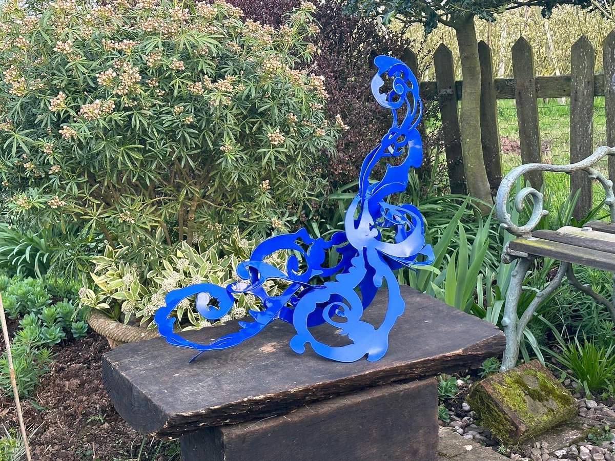 Placing sculptures in a beautiful garden. #sculpture #contemporaryart #contemporarysculpture #artinthegarden #englishcountrygarden #steelsculpture
