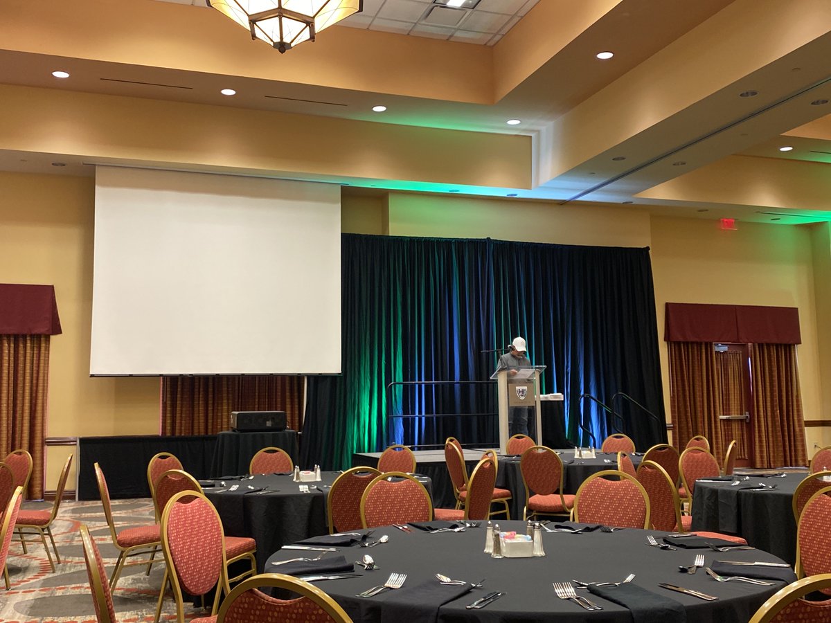 Banquet prep is underway! President Tony Nash testing microphone and getting ready to roll!