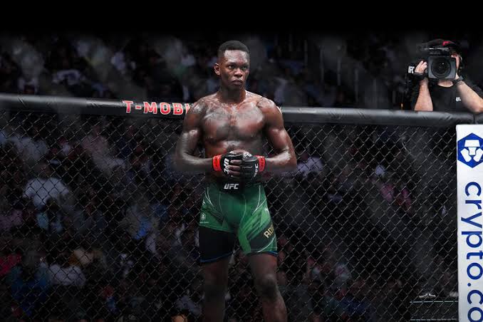WonderbreadMMA's tweet photo. Israel Adesanya is the Middleweight GOAT https://t.co/m5wgLcNQ5c