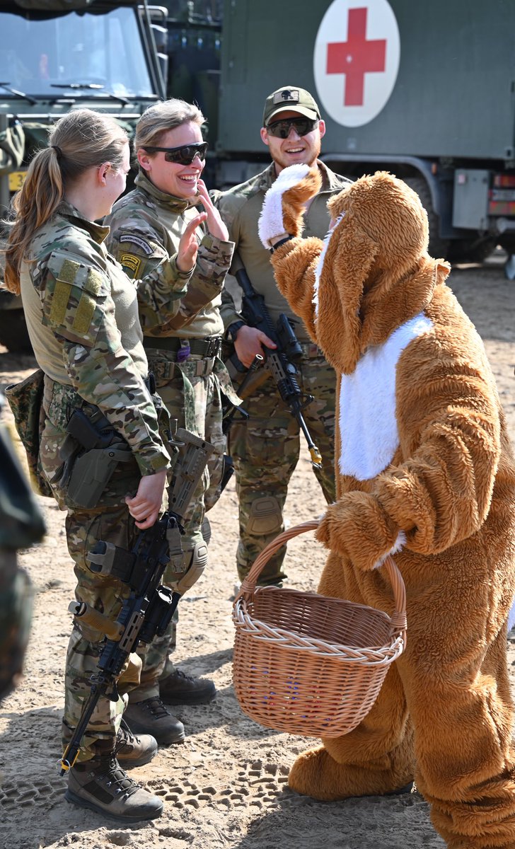 mnbg_lithuania's tweet photo. Today we had a special guest with very long ears. To be honest: His camouflage could be better. At least during our exercise #RisingBull.😉🐰 On behalf of the whole #eFP BG 🇱🇹 we would like to wish a #HappyEaster to all our allies, families, friends, followers and supporters! https://t.co/scFBcZrjmb