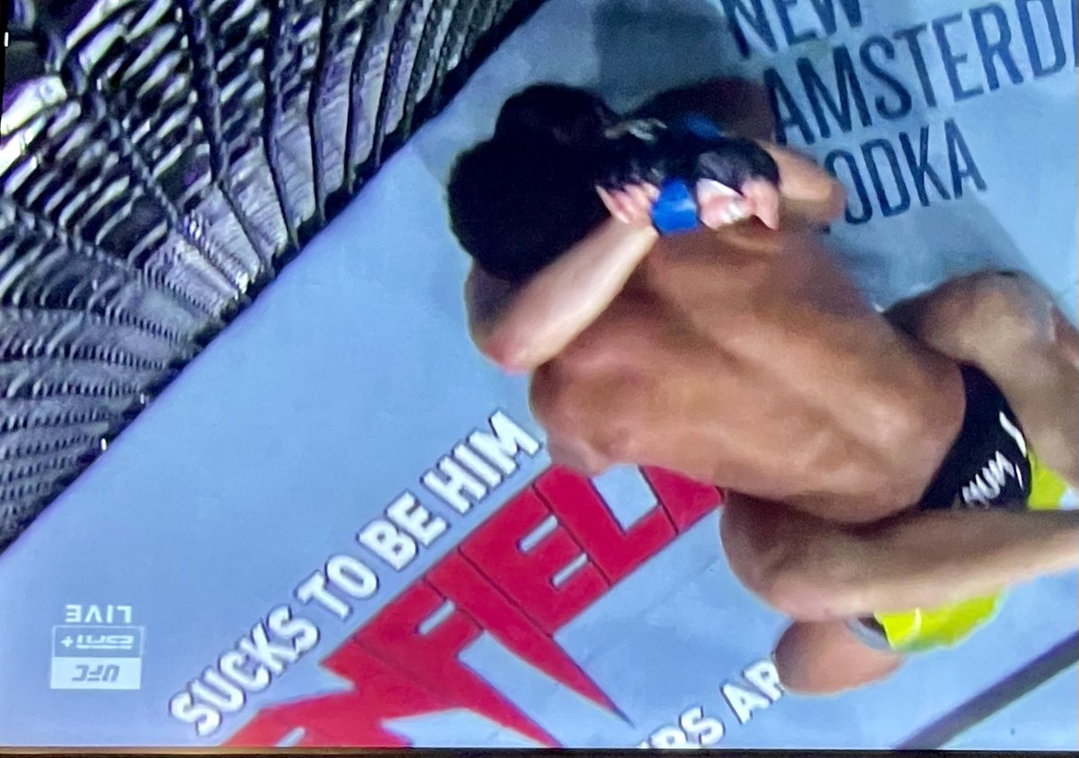 Masvidal getting manhandled in his own town next to an ad that says Sucks To Be Him is very funny for us