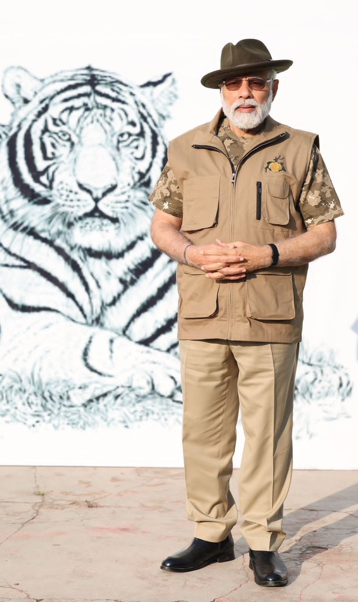 BJP4India's tweet photo. PM Shri @narendramodi shooting big cats, through his camera, during his visit to Bandipur Tiger Reserve in Karnataka. https://t.co/F0wuXWQ0Bx