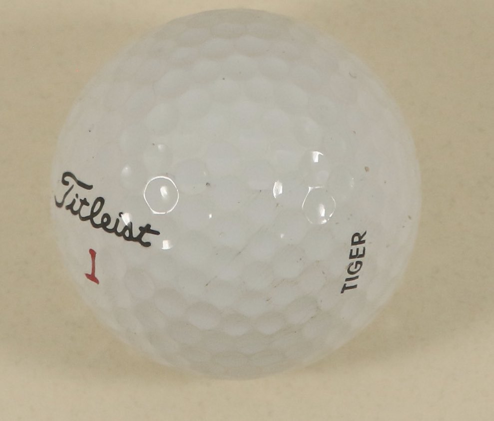 darrenrovell's tweet photo. During his final round at the 1997 Masters, Tiger handed a used golf ball to a 9-year-old boy between the 5th & 6th holes. 

That boy, now a 35 year old man, consigned that ball to @GoldenAgeBid and it sold last night for $64,124, the second highest price ever paid for a golf ball.