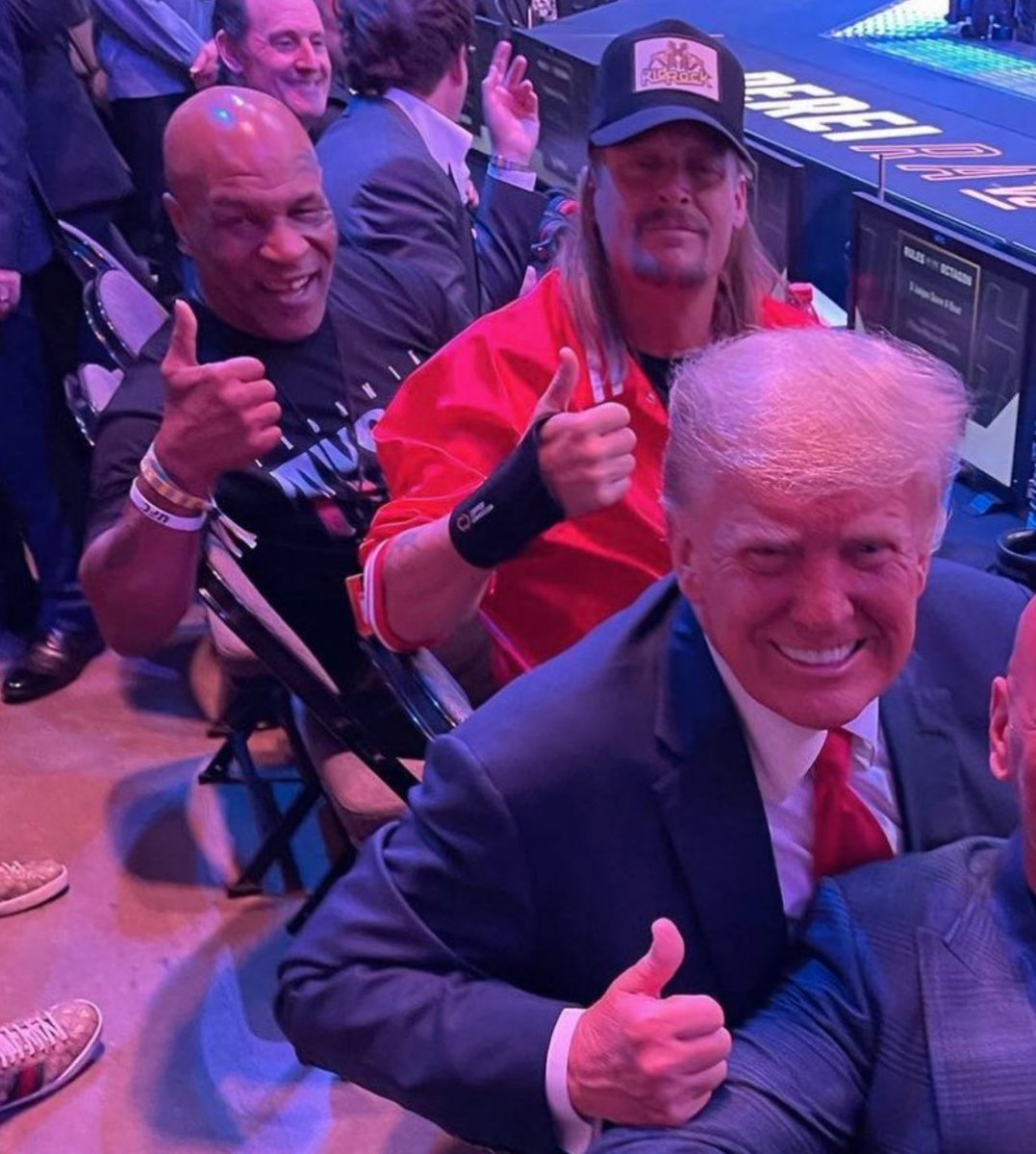 On the eve of Easter an indicted alleged FELON, alleged RAPIST and American flag desecrator all walk into an arena to watch someone get beat up...  

Oh, and he sat next to Kid Rock and Mike Tyson. 

Your past doesn't define you but the way you move forward and change for the