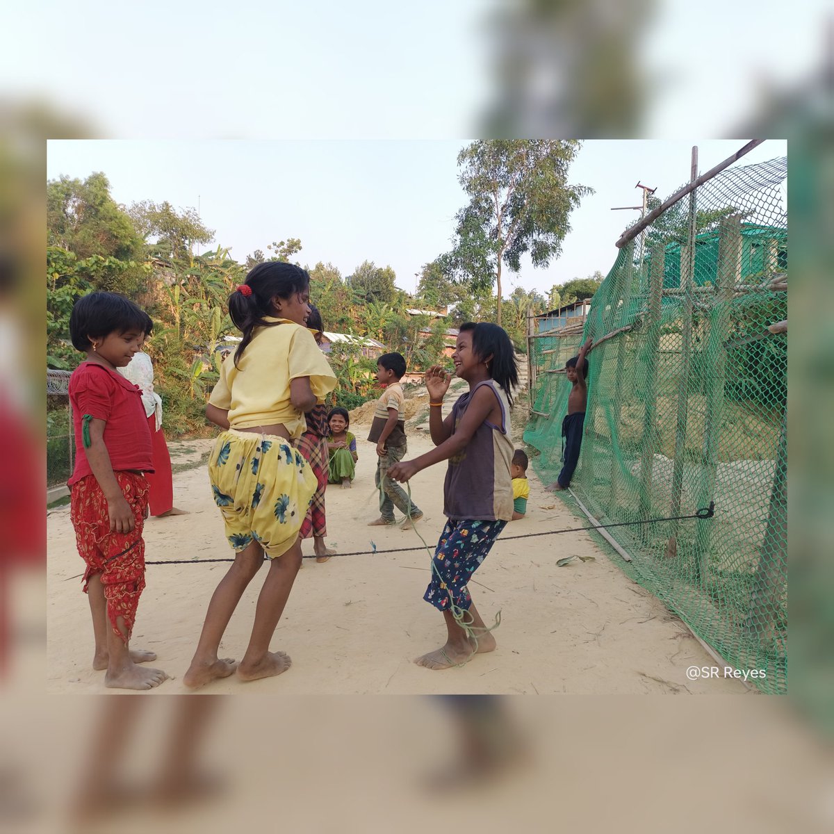 SRReyes22's tweet photo. Some Rohingya girls are skipping. The talented girls are unstoppable. Let them be happy and give them the opportunity to learn as they wish 
#rohingyarefugees
#rohingyacommiuty
#RohingyaCrisis 
#rohingyagirls 
#SaveTheChildren 
#tools 
#srreyes 
@UNHCR_BGD 
@ReDeLaP https://t.co/RNylaOiaae