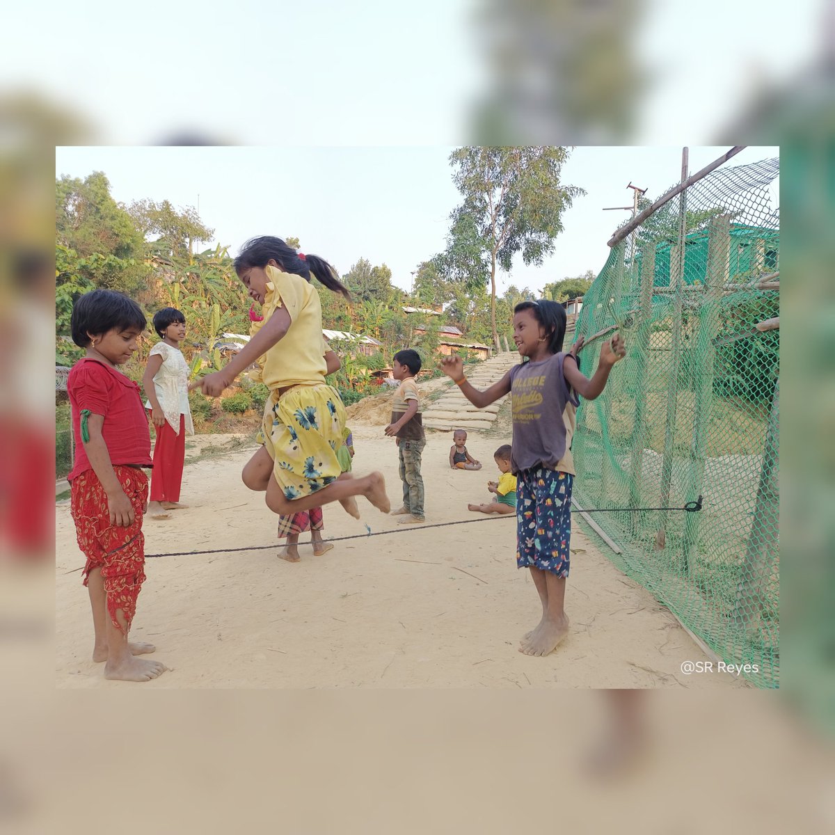 SRReyes22's tweet photo. Some Rohingya girls are skipping. The talented girls are unstoppable. Let them be happy and give them the opportunity to learn as they wish 
#rohingyarefugees
#rohingyacommiuty
#RohingyaCrisis 
#rohingyagirls 
#SaveTheChildren 
#tools 
#srreyes 
@UNHCR_BGD 
@ReDeLaP https://t.co/RNylaOiaae