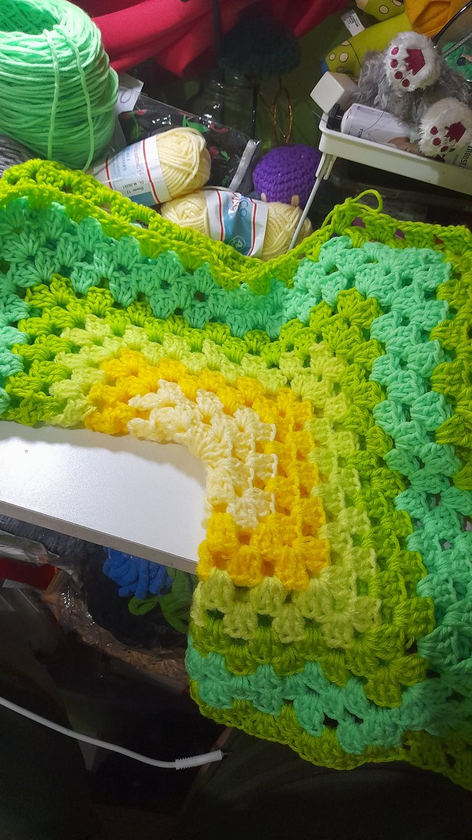 mishamiyuki's tweet photo. It's not yet done, but I finally caved in to making and actually finishing a hexagon cardigan using my yarn stash I haven't touch for years (maybe?) 

It's not yet done, but my friend called it a Frutos cardigan. I might use it at work since I'll return to teaching again. https://t.co/6C76xInMOF