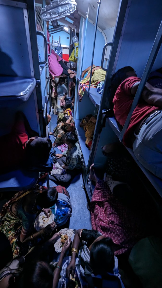 iamsrf8's tweet photo. On top of it there are people sleeping on the floor making it difficult for the travellers with reservation making the journey cumbersome https://t.co/zSFOdwLOiH