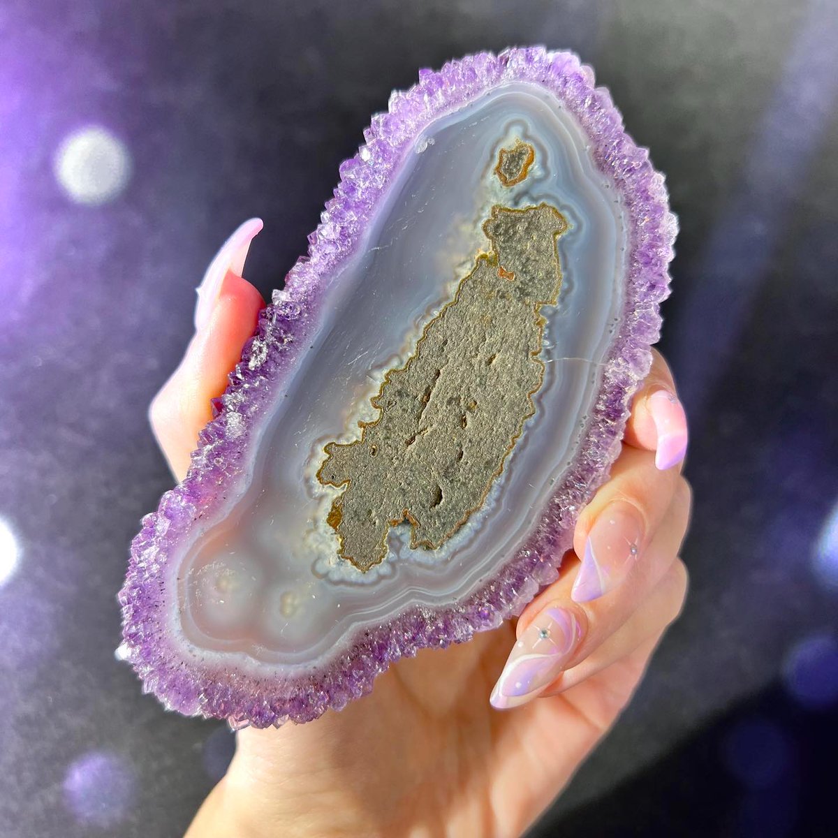 Amethyst Stalactite Slice from Southern Paraná Basalt Basin, Artigas, Uruguay 

credit: Astro Gallery of Gems