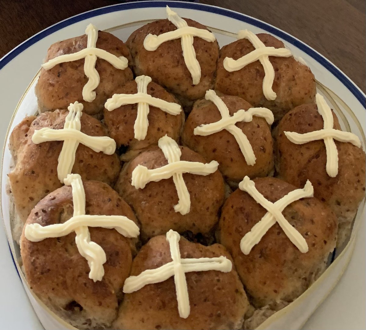 LGCSmith's tweet image. Happy Easter to those that celebrate. I made hot cross buns (a little wonky, but they taste good) and we’re enjoying lots of flowers in our slowly unfolding spring.