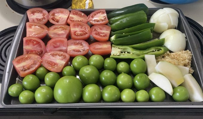 You already know 😏 making some green tomatillo enchilada sauce and a mol&eacute; red sauce.  (Other ingredients