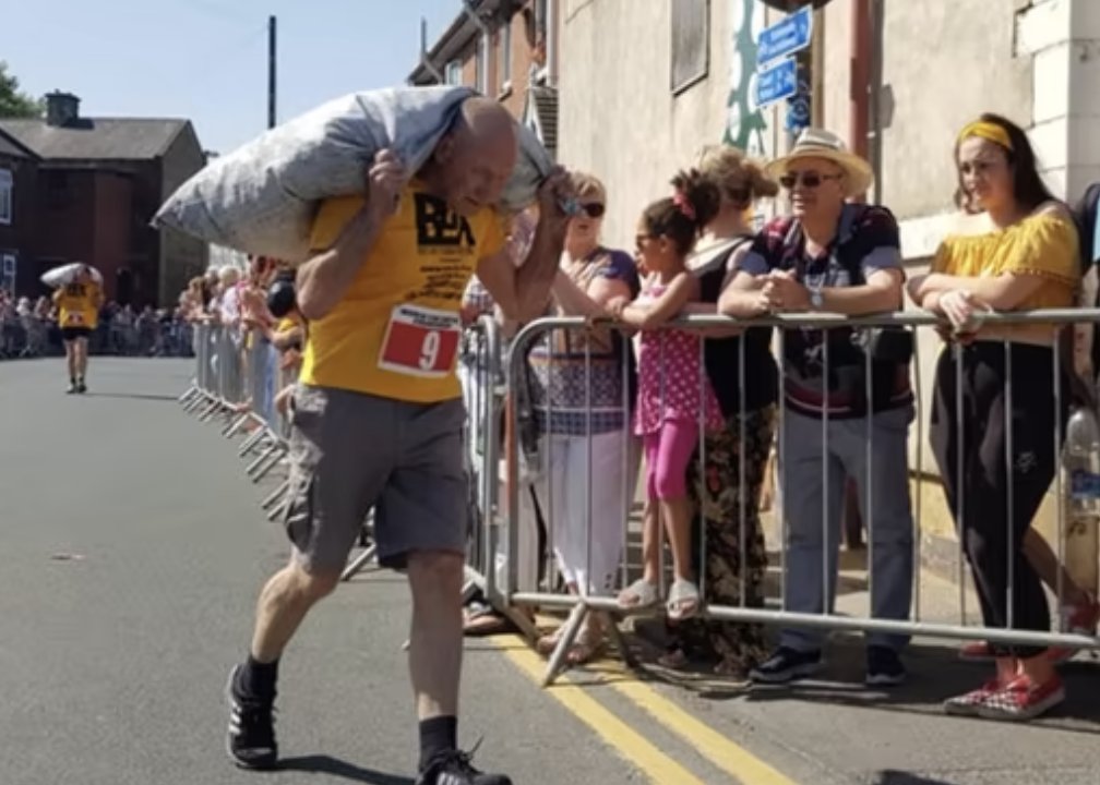 Good luck to the participants in todays Gawthorpe World Coal Carrying Championship. Now in its 60th year, people race through the village with a heavy sack of coal on their backs - the winner being the first person to drop their bag of coal onto the Maypole village green.